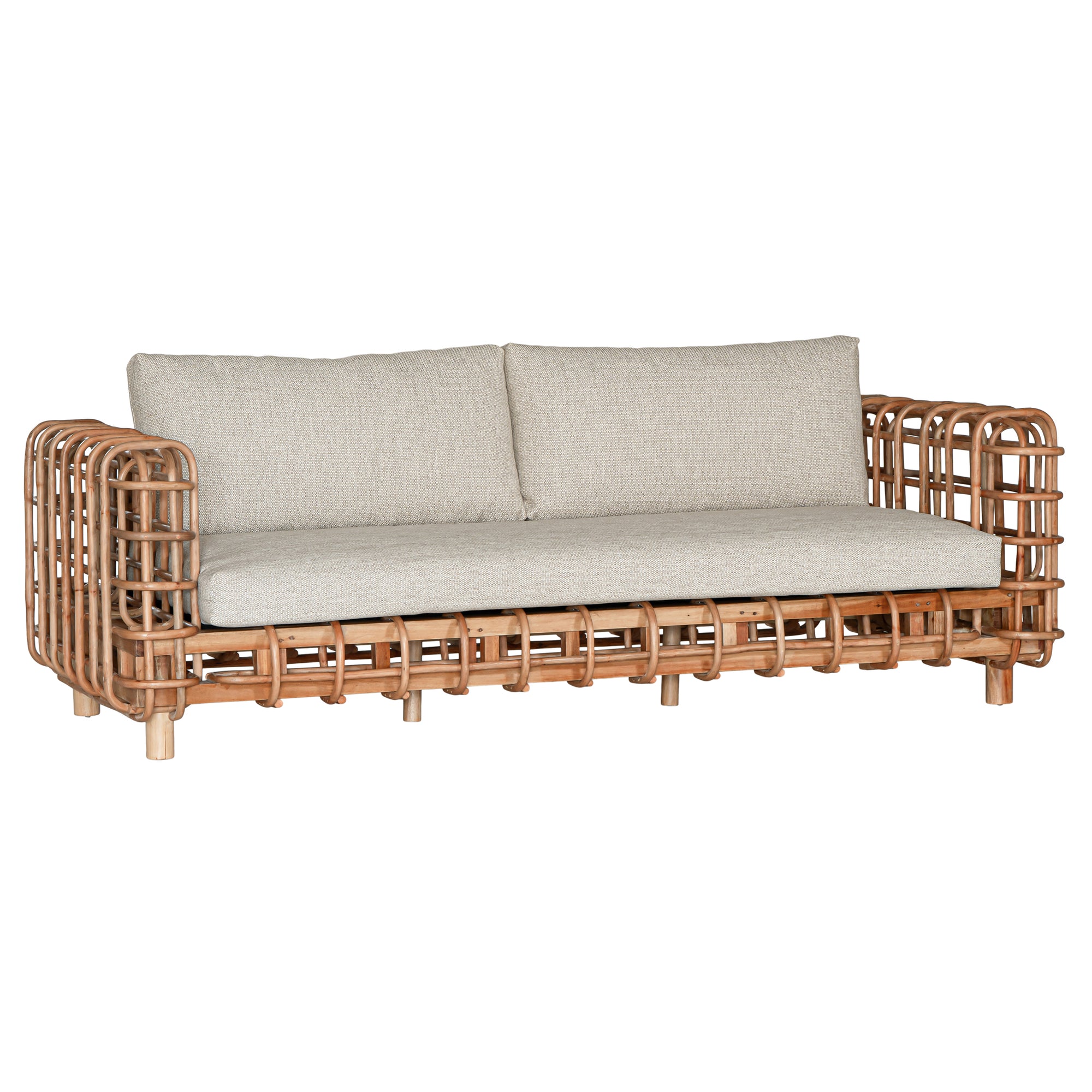 Handcrafted rattan two seater sofa featuring an intricate open-weave frame with plush natural cushions, combining natural texture with contemporary comfort for indoor or covered outdoor spaces