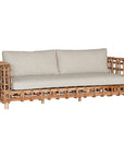 Handcrafted rattan two seater sofa featuring an intricate open-weave frame with plush natural cushions, combining natural texture with contemporary comfort for indoor or covered outdoor spaces