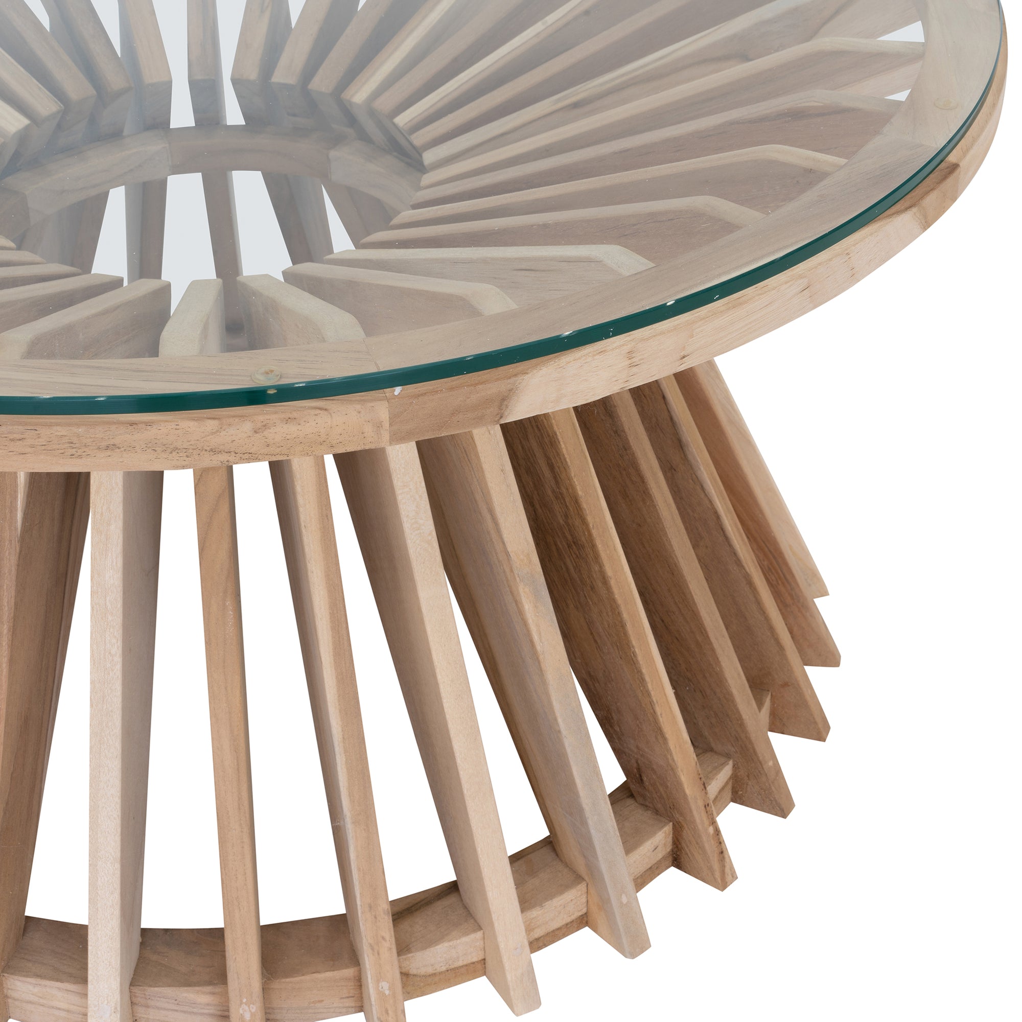 A stylish round dining table featuring a sculptural wooden base with a clear glass top, offering a contemporary yet natural aesthetic for modern dining spaces.