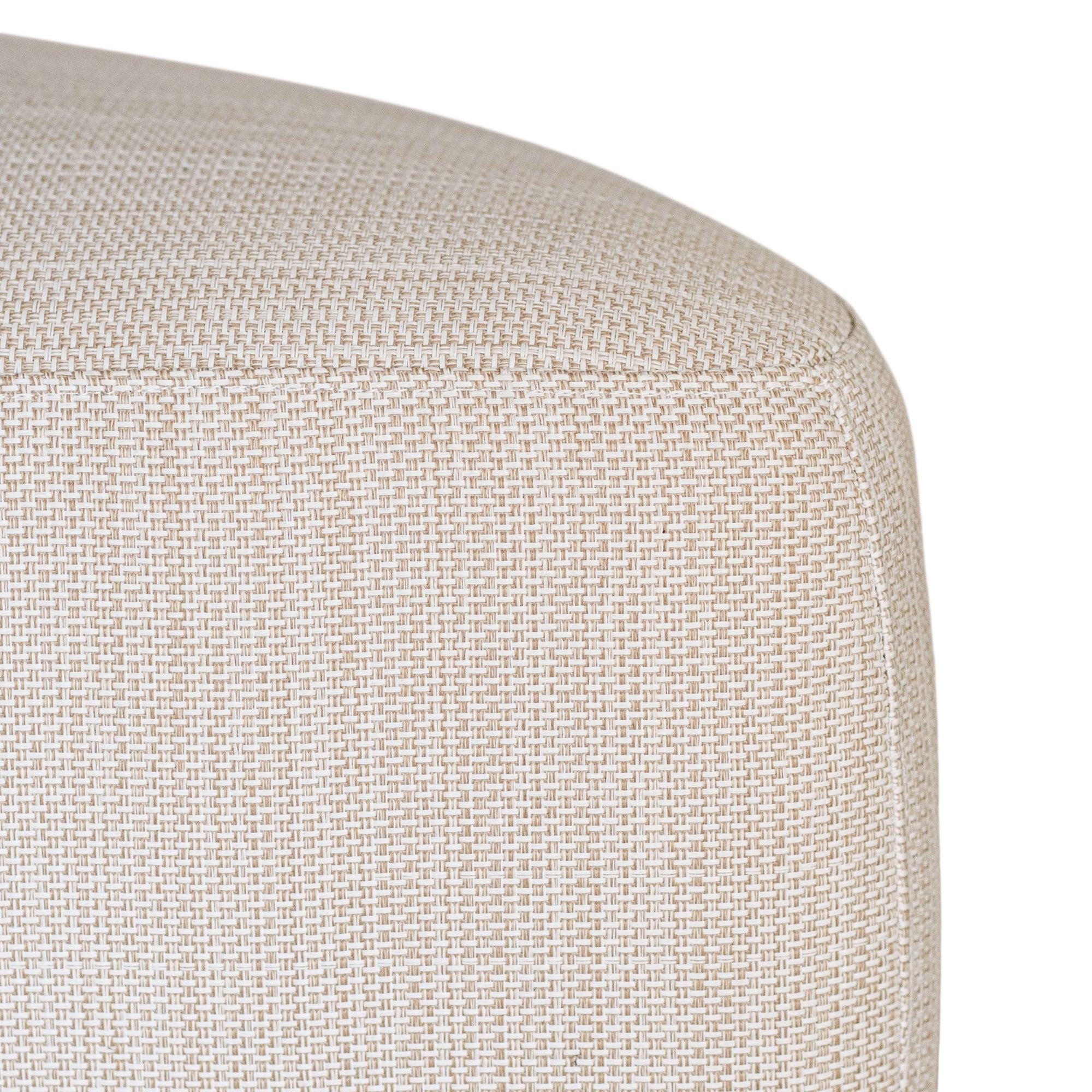 Curved upholstered ottoman with natural textured fabric and subtle black feet, ideal for contemporary living spaces