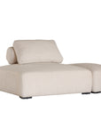 Curved upholstered ottoman with natural textured fabric and subtle black feet, ideal for contemporary living spaces