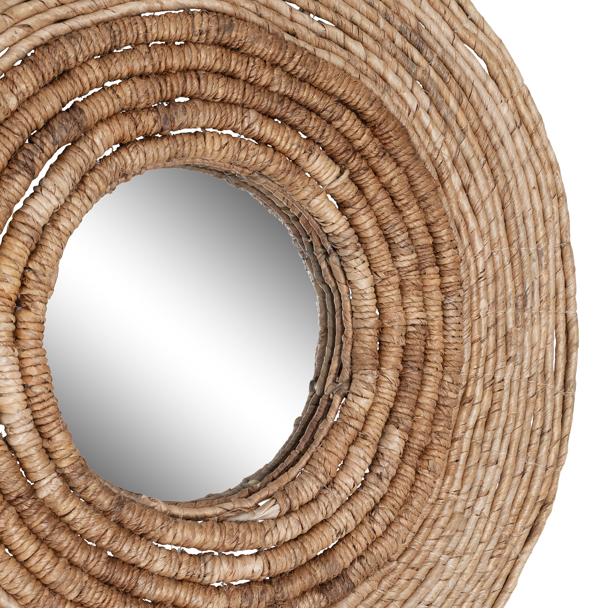 Round woven wall mirror with natural fibre frame, ideal for adding a coastal and rustic touch to interior spaces