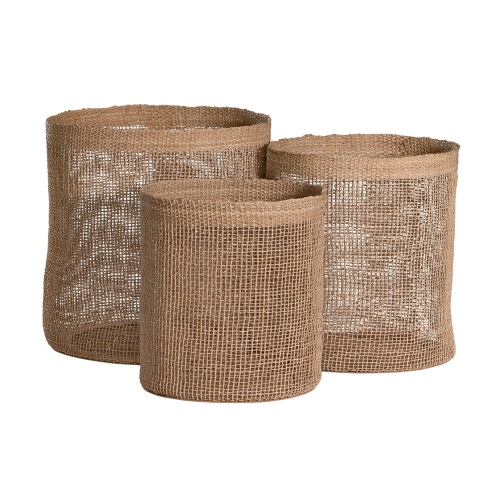 Set of three natural jute storage baskets with open weave design, perfect for stylish organisation and coastal decor.