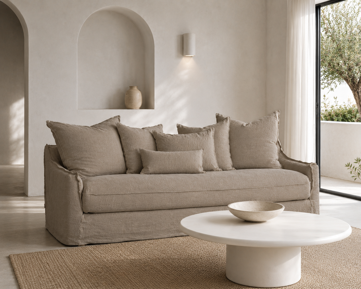 Sirocco Sofa in Natural creates a calm and inviting living room with soft neutral tones and timeless relaxed styling.