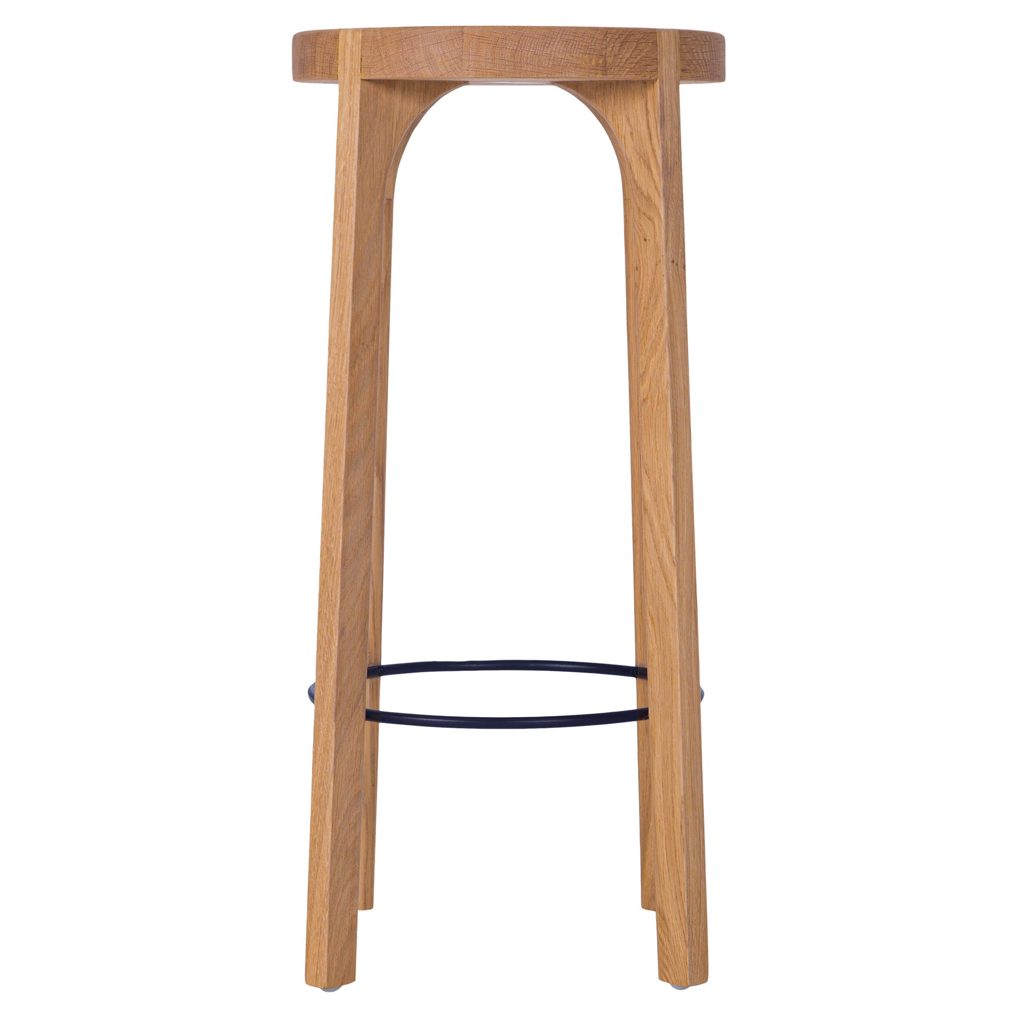 Kulala Living solid oak bar stool with a round seat and black metal footrest. A minimalist and timeless design, perfect for contemporary and coastal interiors