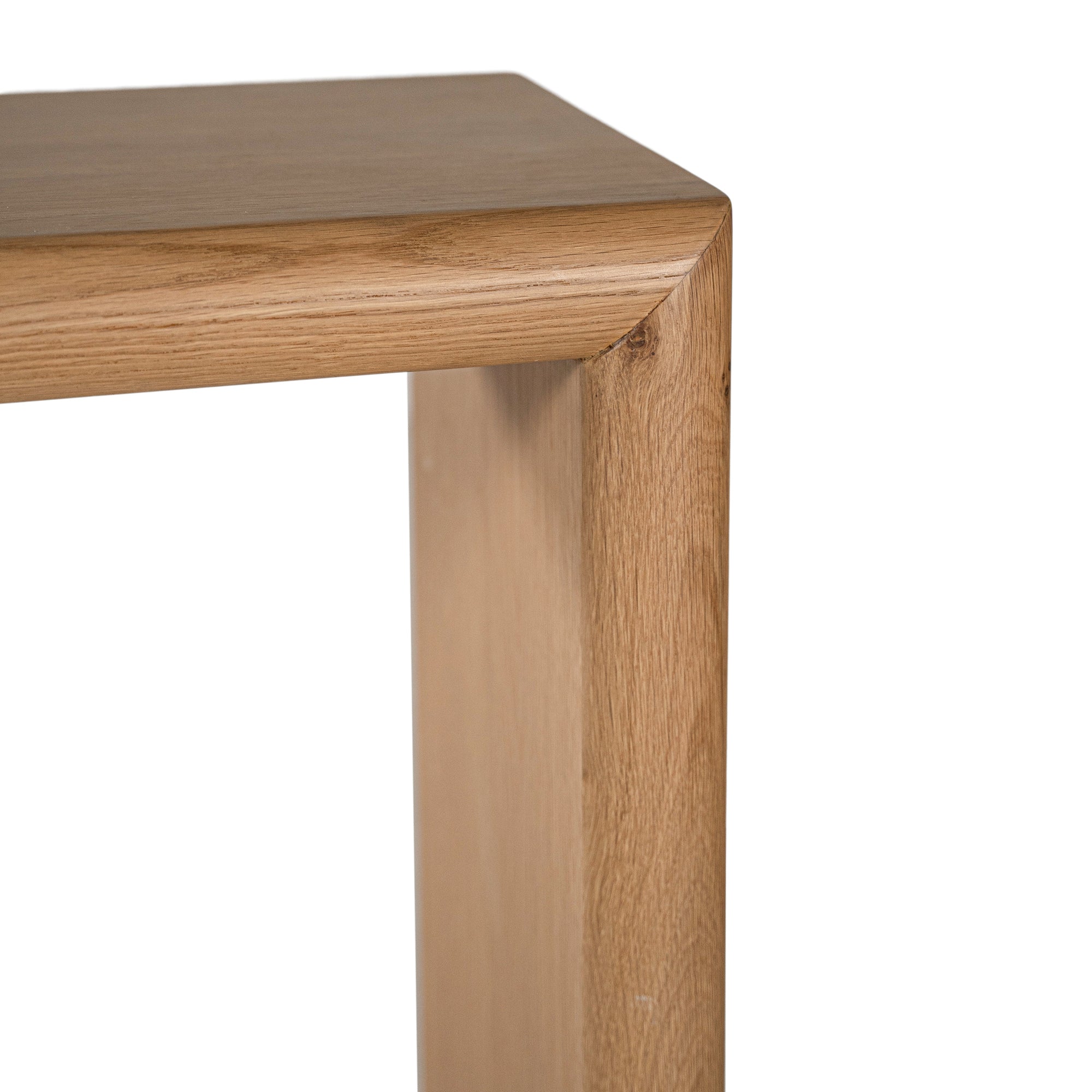 Solid oak console table with clean, minimalist lines and natural woodgrain finish, perfect for contemporary hallways or living spaces