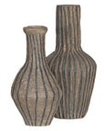 Striped paper mache vase with a rustic texture, perfect as a decorative accent piece for modern and bohemian interiors.