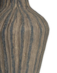 Striped paper mache vase with a rustic texture, perfect as a decorative accent piece for modern and bohemian interiors.