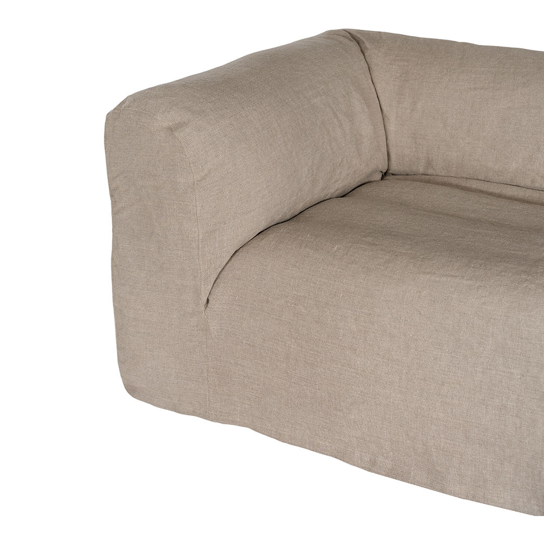 Sunset modular sofa in natural linen with a relaxed low profile modular design.