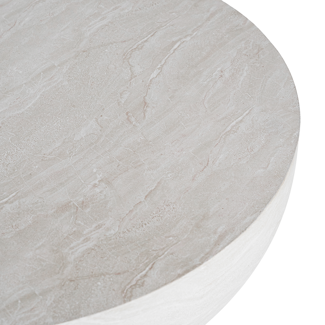 Tabati coffee table in eggshell finish with smooth rounded bowl shape and sculptural low profile design.