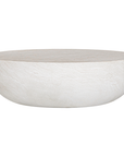 Tabati coffee table in eggshell finish with smooth rounded bowl shape and sculptural low profile design.