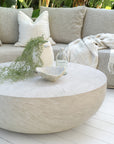 Tabati coffee table in eggshell finish styled with Laguna sofa in oat drift creating a relaxed outdoor setting with soft textures and natural tones.