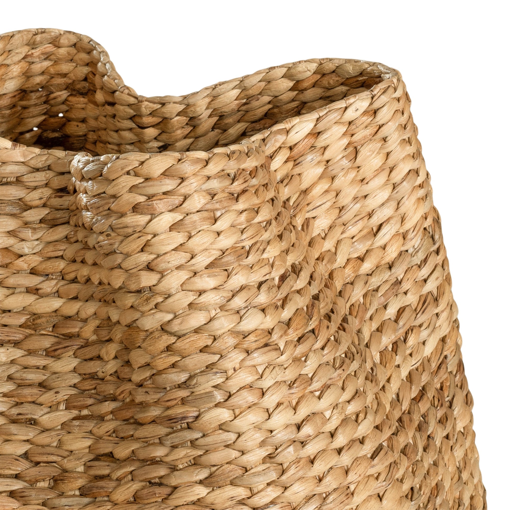 Talura basket set in natural handwoven seagrass with organic rounded shape and softly structured open tops.