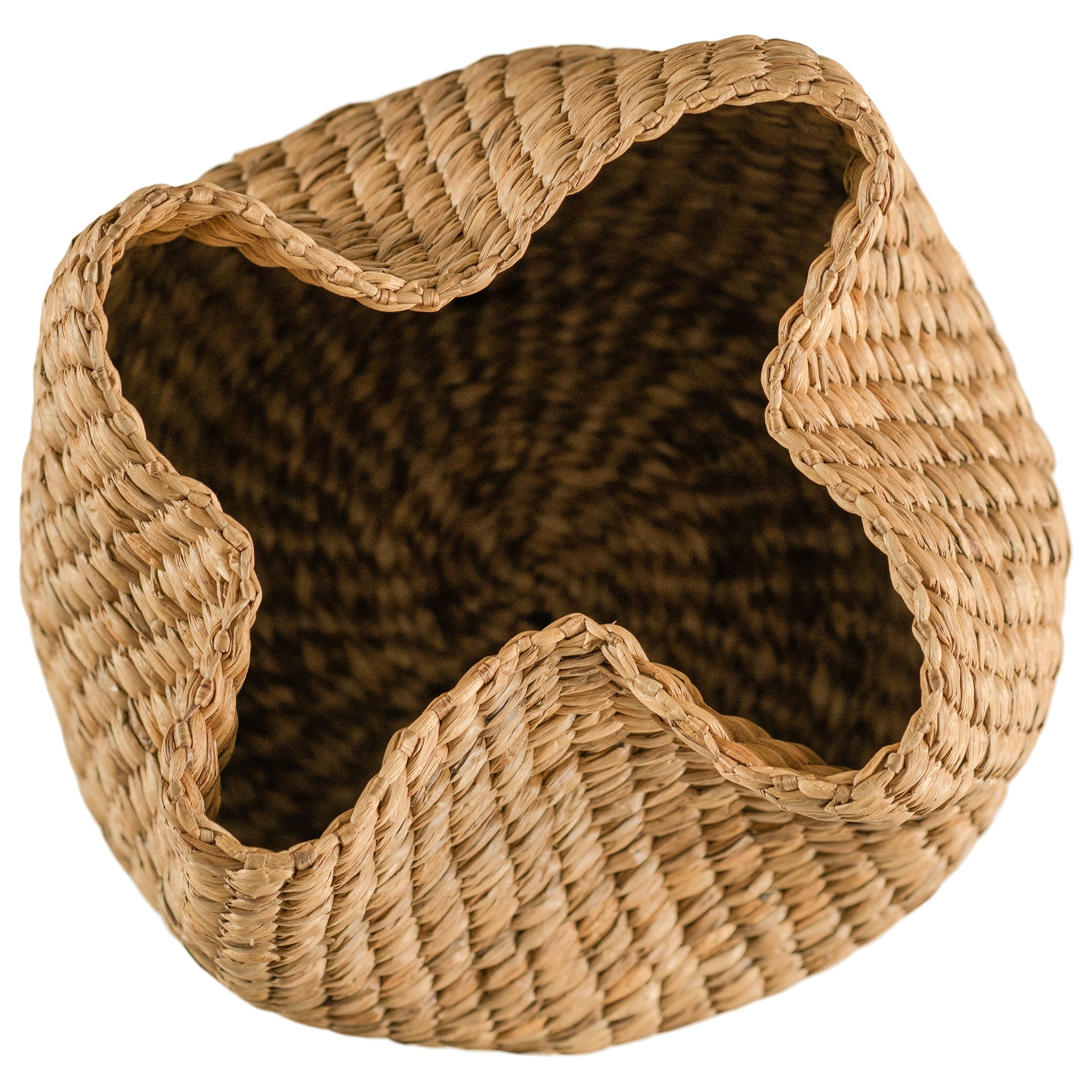 Talura basket set in natural handwoven seagrass with organic rounded shape and softly structured open tops.