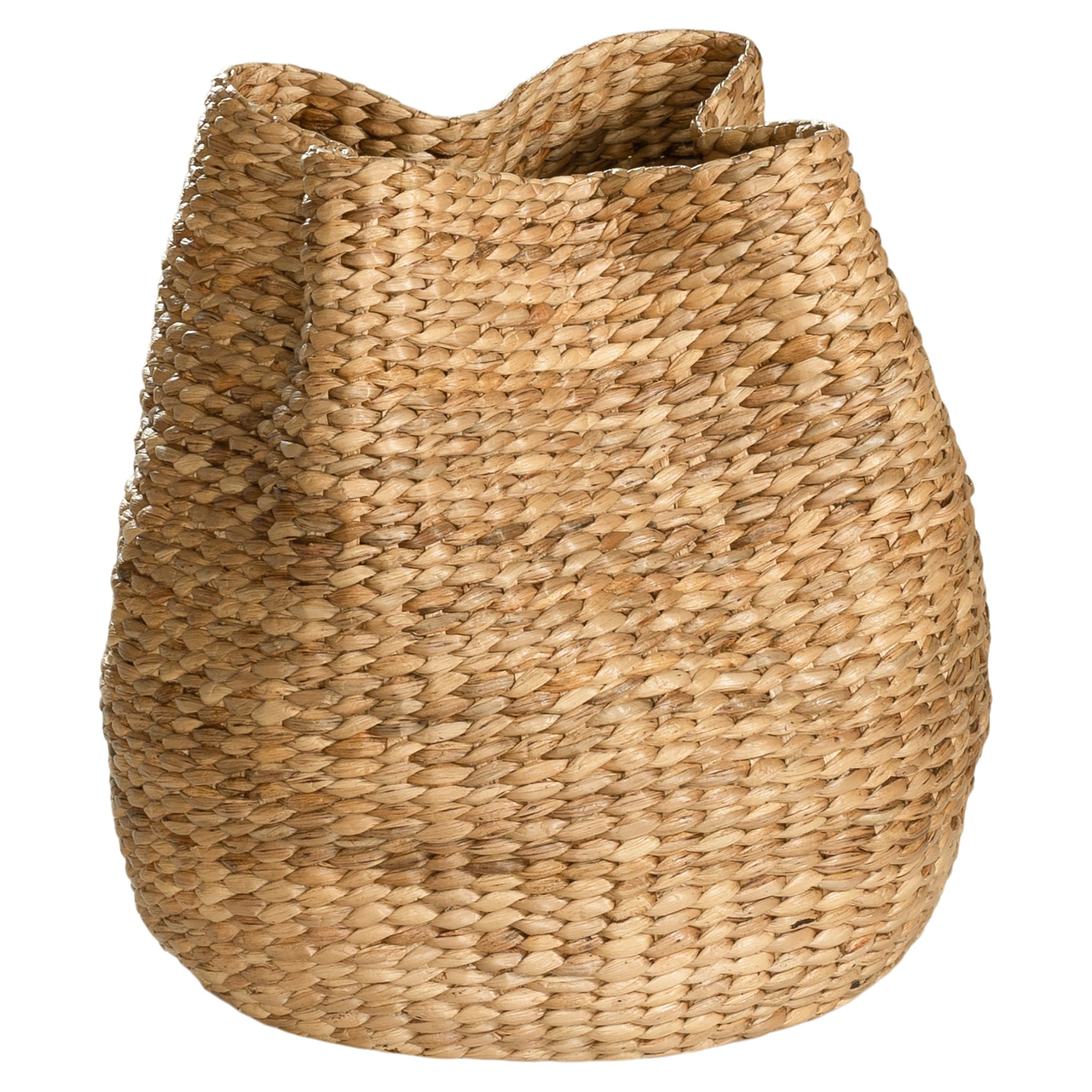 Talura basket set in natural handwoven seagrass with organic rounded shape and softly structured open tops.