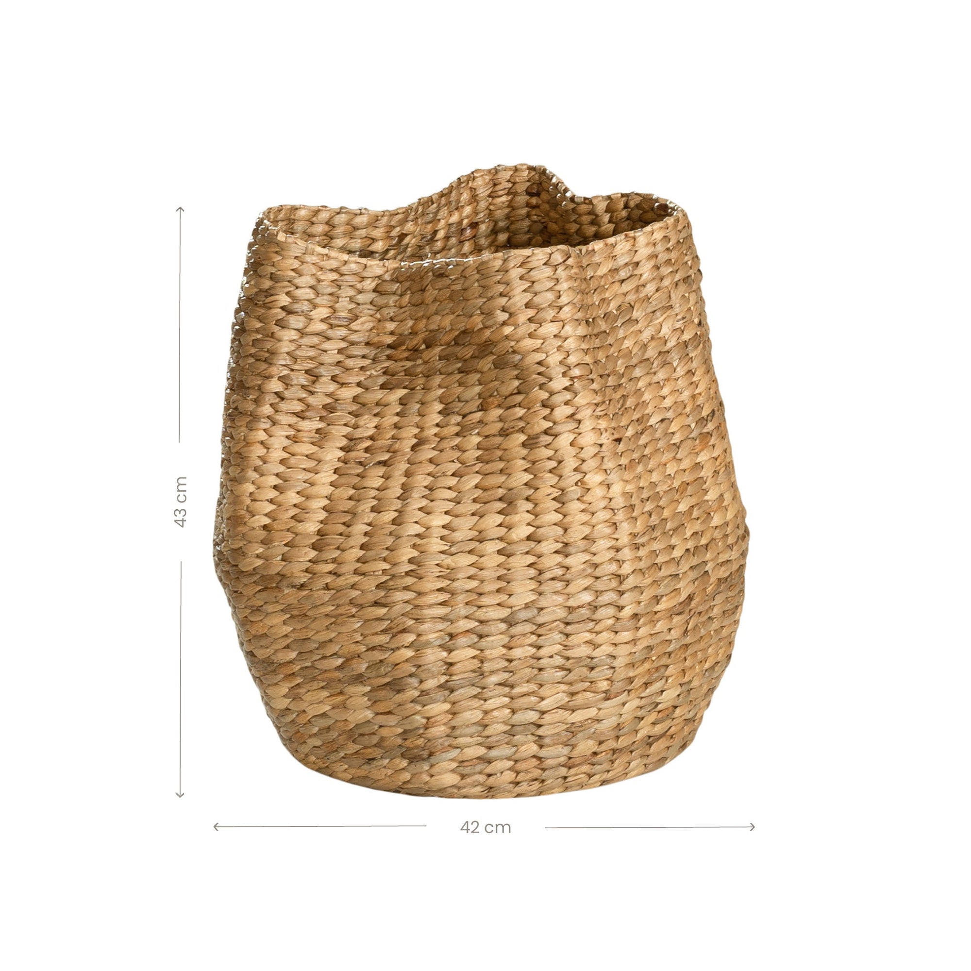 Talura basket in natural handwoven seagrass with organic rounded shape and softly structured open tops.