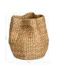 Talura basket in natural handwoven seagrass with organic rounded shape and softly structured open tops.