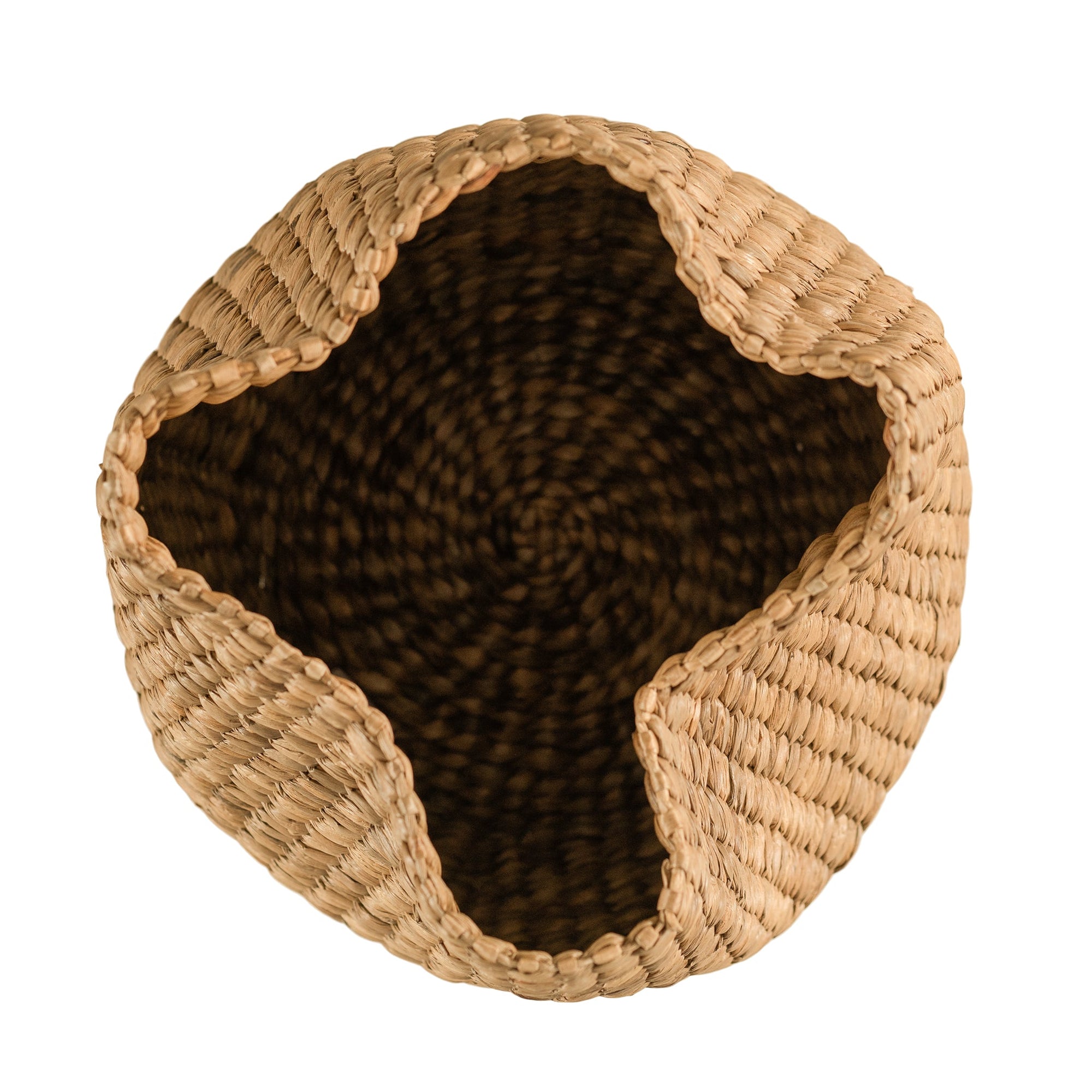Talura basket set in natural handwoven seagrass with organic rounded shape and softly structured open tops.