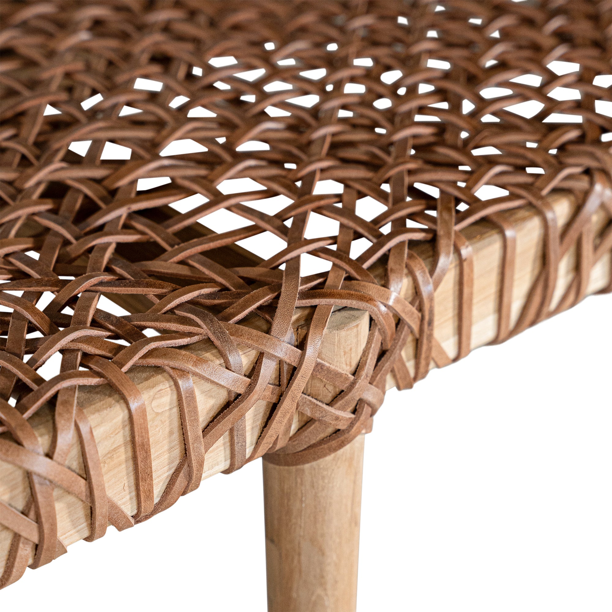 Natural teak and leather bench with a woven seat and solid wooden frame, showcasing artisanal craftsmanship and organic textures