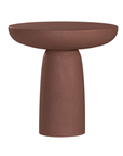 Tarran side table in cinnabar clay finish with rounded top and sculptural cylindrical leg.