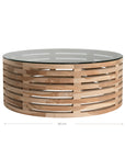 The Kulala Living Teak and Glass Coffee Table features a beautifully crafted open-weave teak base with a round glass top. This contemporary design blends natural warmth with modern elegance, making it a stylish centrepiece for any living space