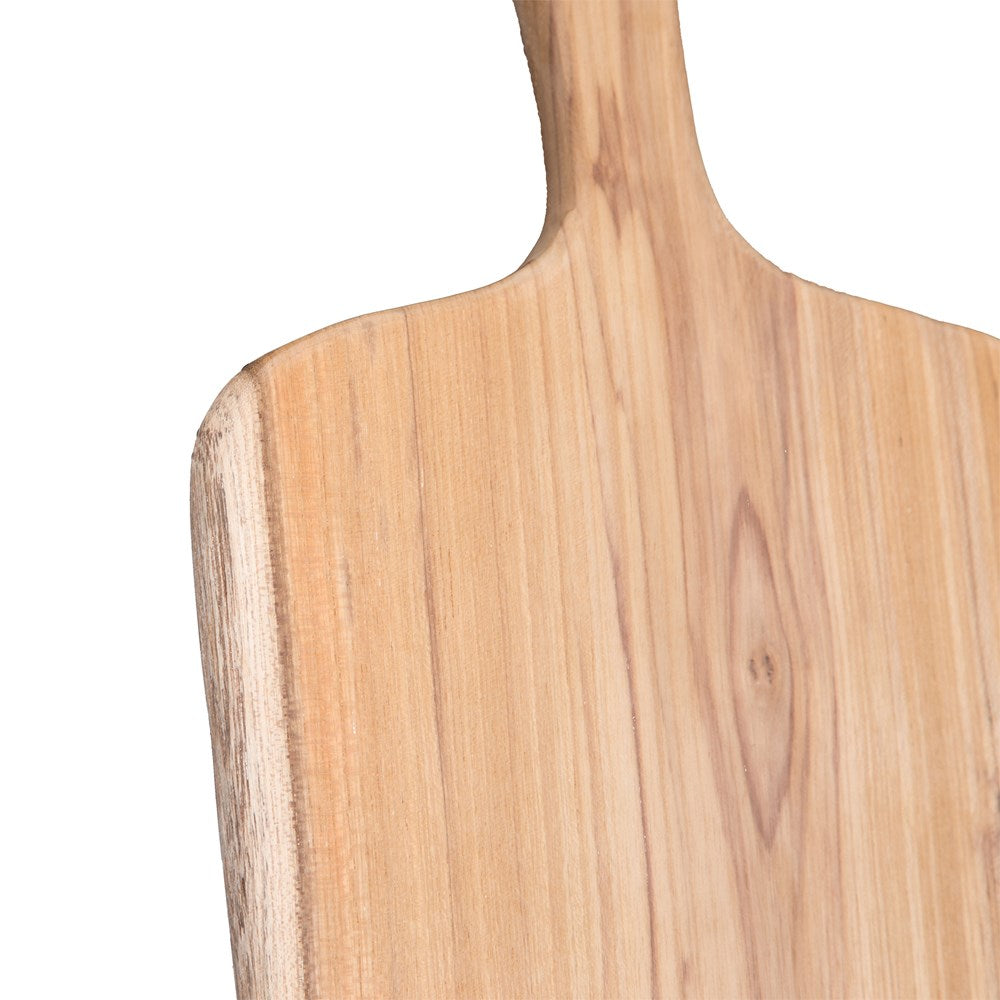 Teak carved chopping board in a natural finish with elongated handle and visible timber grain, photographed on a clean white background.
