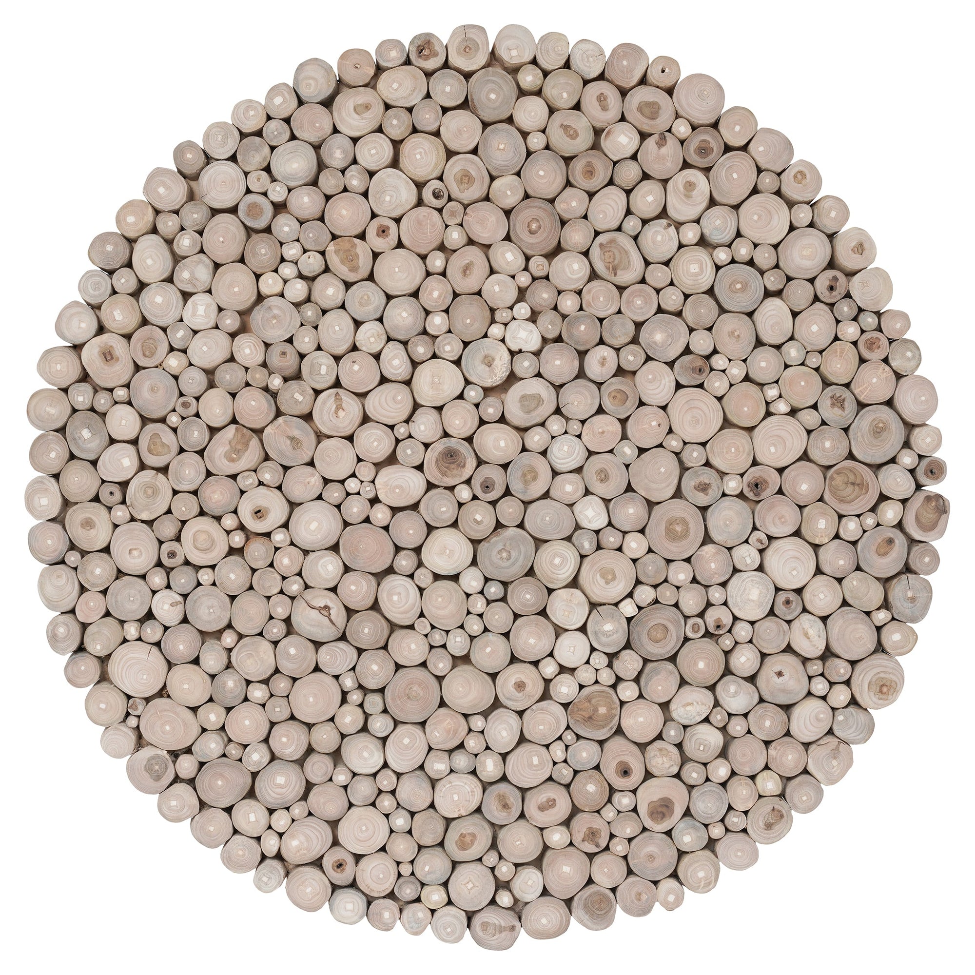 A round coffee table crafted from natural teak branches, arranged in a drum-style design. The organic texture and neutral tones make it a statement piece for coastal and contemporary interiors.