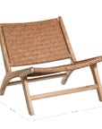 A beautifully handcrafted lounge chair featuring a solid teak wood frame and a woven tan leather seat and backrest. Designed for comfort and style, this contemporary accent chair is perfect for relaxed indoor settings
