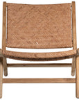 A beautifully handcrafted lounge chair featuring a solid teak wood frame and a woven tan leather seat and backrest. Designed for comfort and style, this contemporary accent chair is perfect for relaxed indoor settings