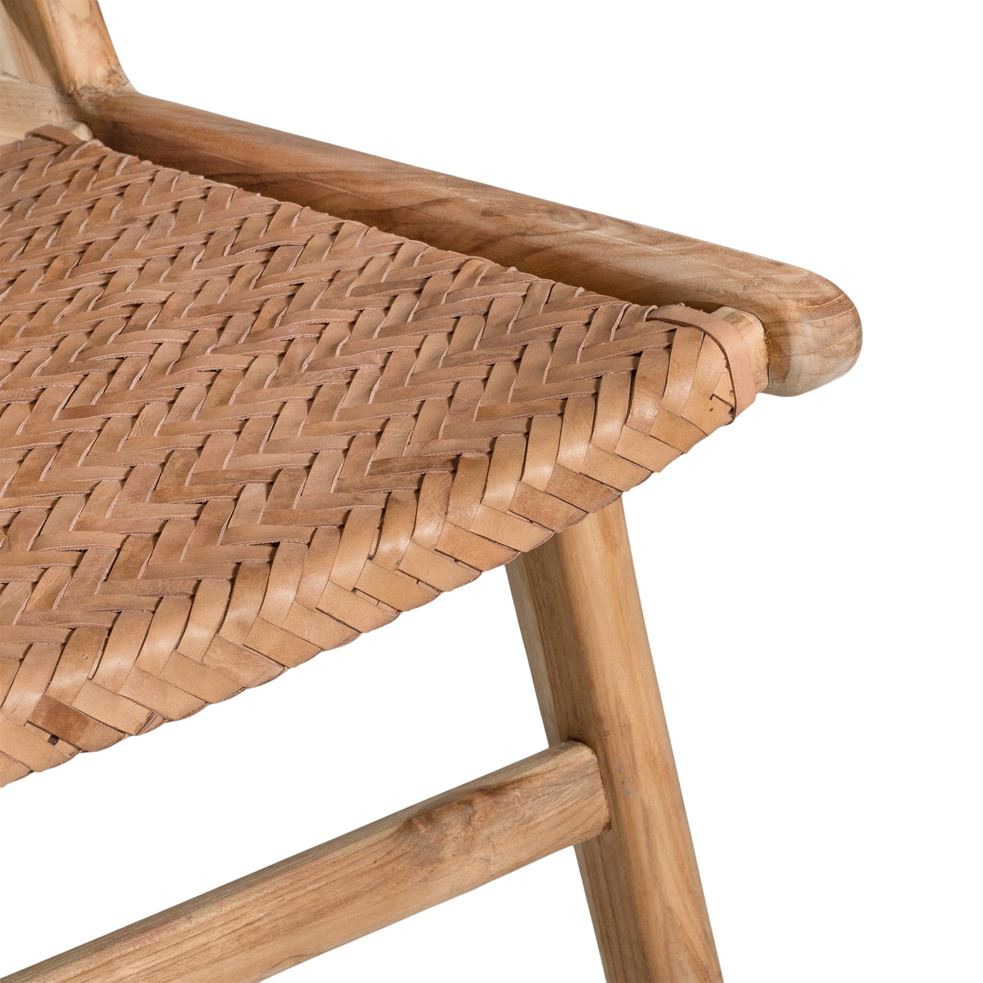A beautifully handcrafted lounge chair featuring a solid teak wood frame and a woven tan leather seat and backrest. Designed for comfort and style, this contemporary accent chair is perfect for relaxed indoor settings