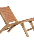 A beautifully handcrafted lounge chair featuring a solid teak wood frame and a woven tan leather seat and backrest. Designed for comfort and style, this contemporary accent chair is perfect for relaxed indoor settings