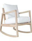 Natural teak rocking chair with white cushion, showcasing minimalist design and relaxed comfort. Ideal for indoor and outdoor settings.