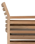 A contemporary teak outdoor dining chair featuring a striking slatted design and a taupe seat cushion for added comfort. Perfect for stylish alfresco dining