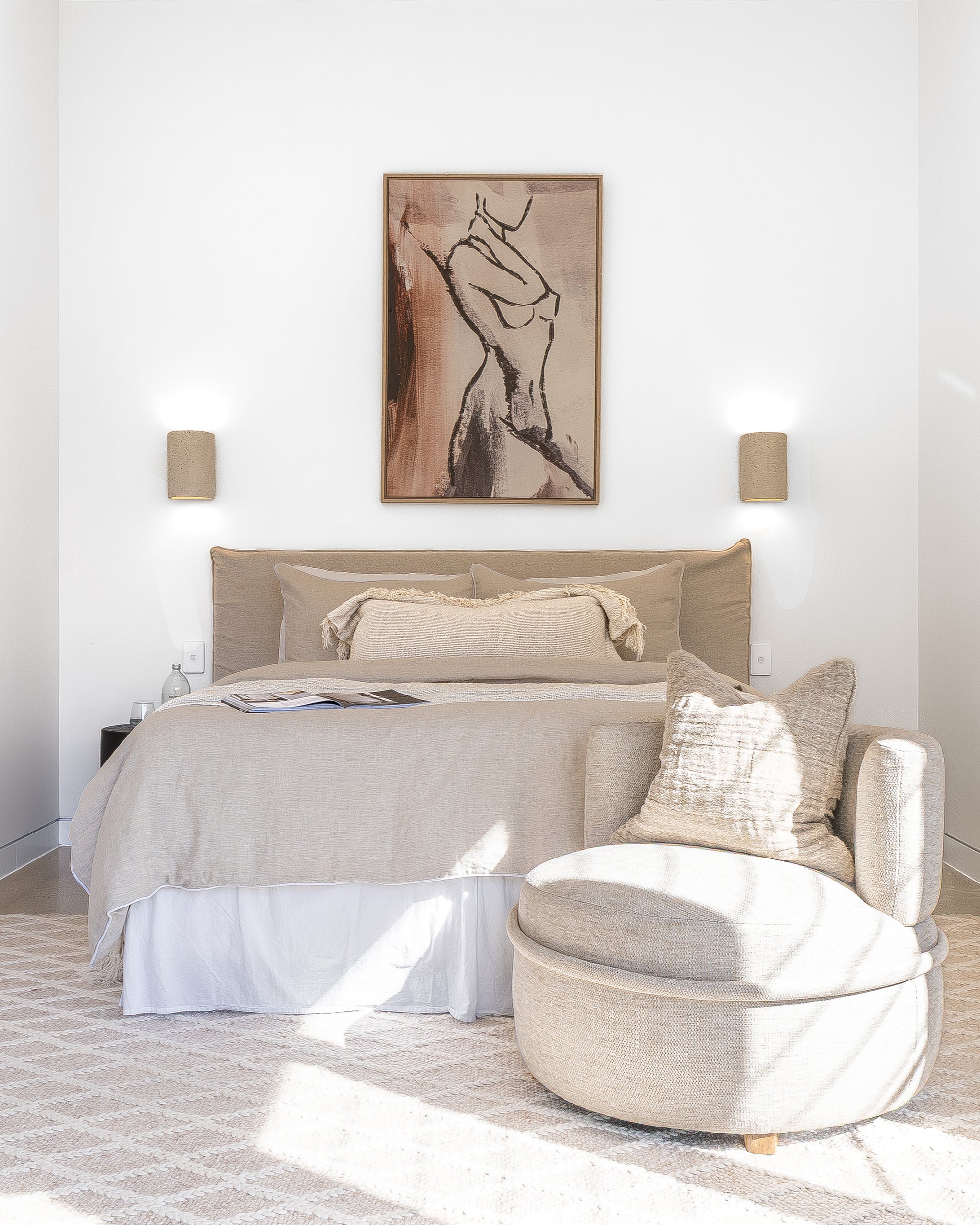 Toro Occasional Chair styled in a tranquil bedroom setting with neutral-toned bedding, textured cushions, and soft natural light for a serene and inviting look