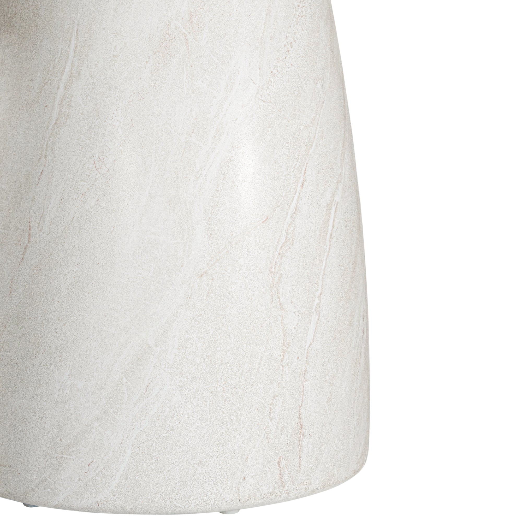 A luxurious round dining table crafted from natural travertine stone, featuring a sculptural pedestal base and smooth, polished finish. Perfect for contemporary and minimalist interiors