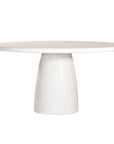 A luxurious round dining table crafted from natural travertine stone, featuring a sculptural pedestal base and smooth, polished finish. Perfect for contemporary and minimalist interiors