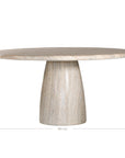 A luxurious round dining table crafted from natural travertine stone, featuring a sculptural pedestal base and smooth, polished finish. Perfect for contemporary and minimalist interiors