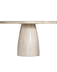 A luxurious round dining table crafted from natural travertine stone, featuring a sculptural pedestal base and smooth, polished finish. Perfect for contemporary and minimalist interiors