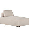 Natural textured outdoor fabric chaise lounge with plush cushion, offering luxurious and relaxing seating for contemporary interiors.