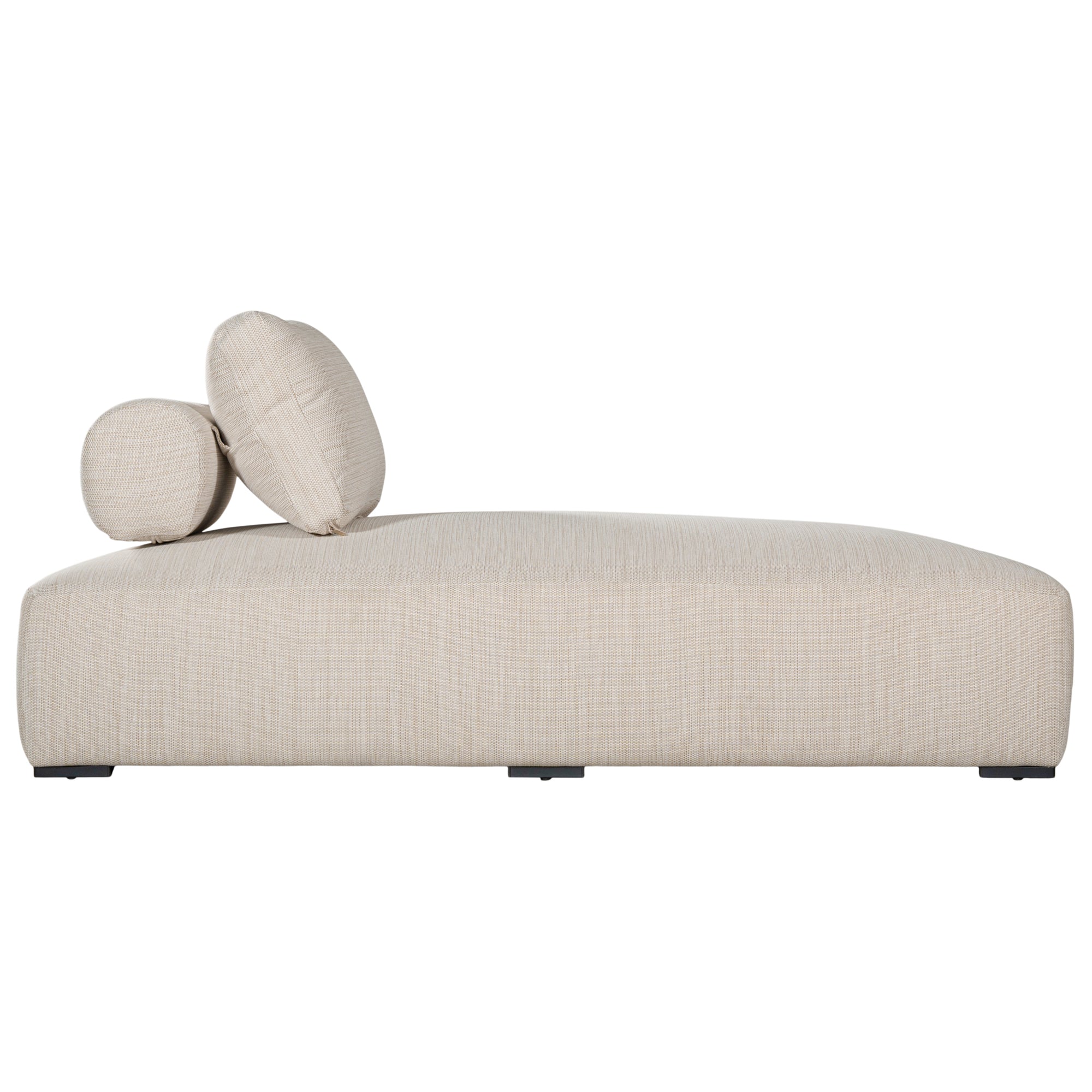 Natural textured outdoor fabric chaise lounge with plush cushion, offering luxurious and relaxing seating for contemporary interiors.