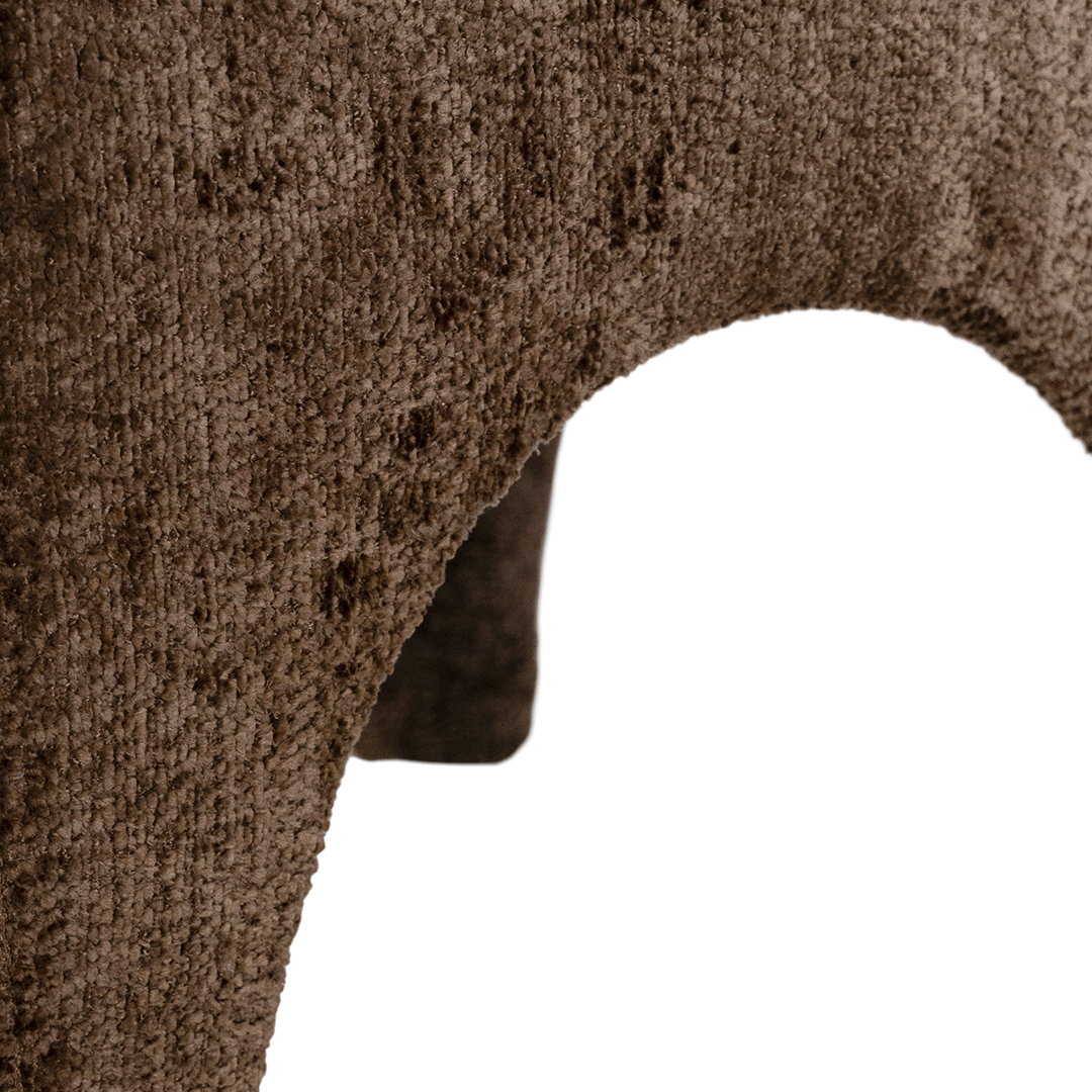 Tucan dining chair in mocha with a sculptural curved form styled for modern organic mediterranean inspired australian interiors