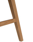 A modern upholstered dining chair featuring a curved backrest and soft white fabric, supported by sturdy oak timber legs with a natural finish