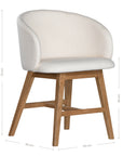 A modern upholstered dining chair featuring a curved backrest and soft white fabric, supported by sturdy oak timber legs with a natural finish