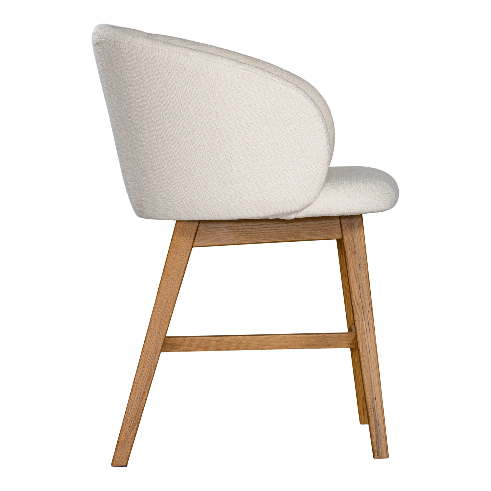 A modern upholstered dining chair featuring a curved backrest and soft white fabric, supported by sturdy oak timber legs with a natural finish
