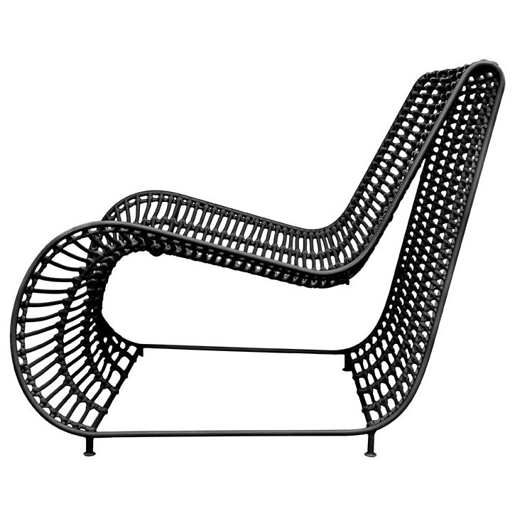 Sleek black rattan lounge chair with a modern curved silhouette and sturdy metal frame, perfect for outdoor or indoor relaxation spaces