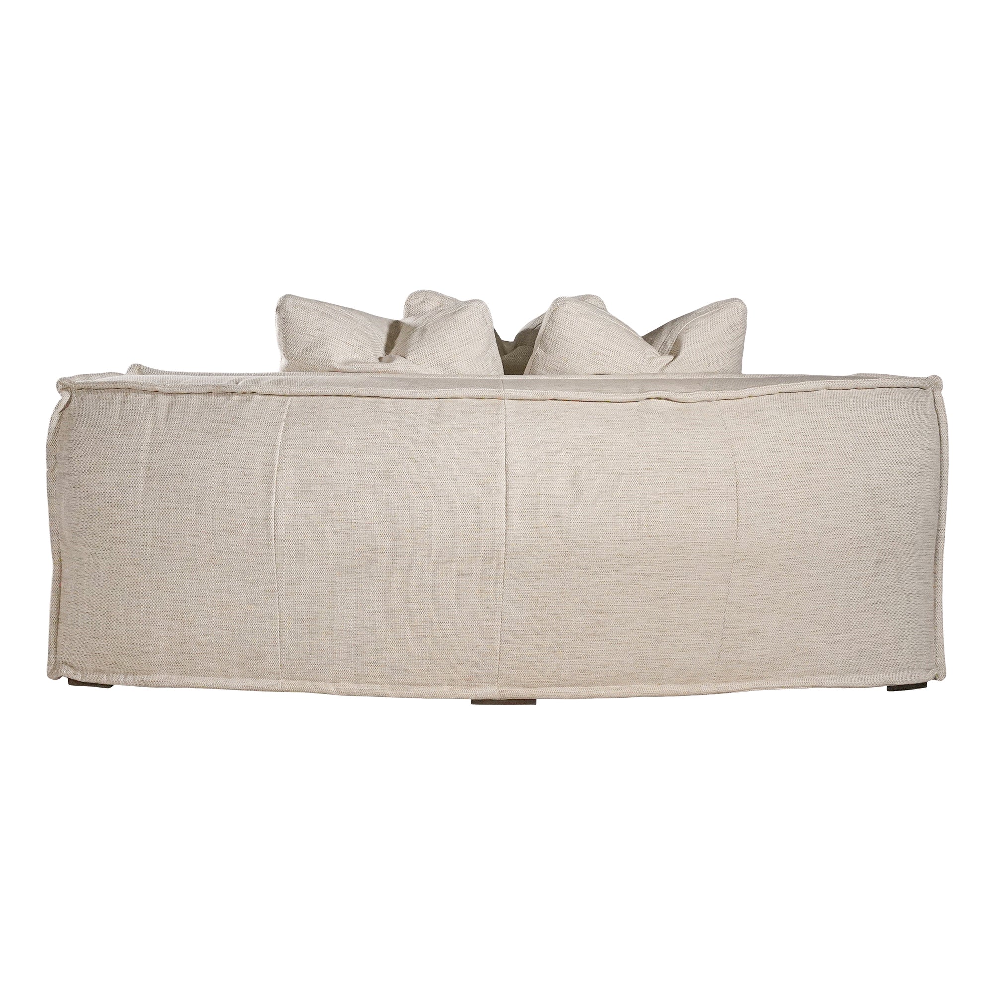 Luxurious modern curved sectional sofa with soft neutral upholstery and plush cushions, designed for ultimate comfort and contemporary living spaces