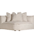 Luxurious modern curved sectional sofa with soft neutral upholstery and plush cushions, designed for ultimate comfort and contemporary living spaces