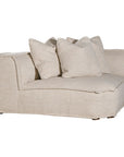 Luxurious modern curved sectional sofa with soft neutral upholstery and plush cushions, designed for ultimate comfort and contemporary living spaces