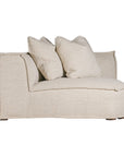 Luxurious modern curved sectional sofa with soft neutral upholstery and plush cushions, designed for ultimate comfort and contemporary living spaces