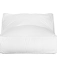 White lounge bean bag for outdoor relaxation, featuring durable fabric and ergonomic shape. Ideal for poolside lounging, garden seating, or creating a casual chill-out area.